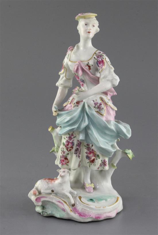A Derby group of a Shepherdess and a sheep, c. 1760, h. 26.5cm, slight restoration